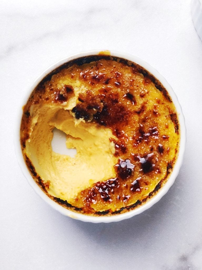 pumpkin creme brulee view from the top with a scoop taken out