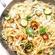 Pasta Nerano mixed together in a stainless steel frying pan