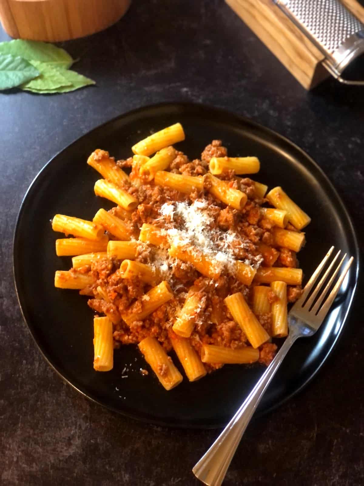 bolognese with pasta on a plate