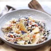 Cranberry Apple Coleslaw in a large bowl on the counter.